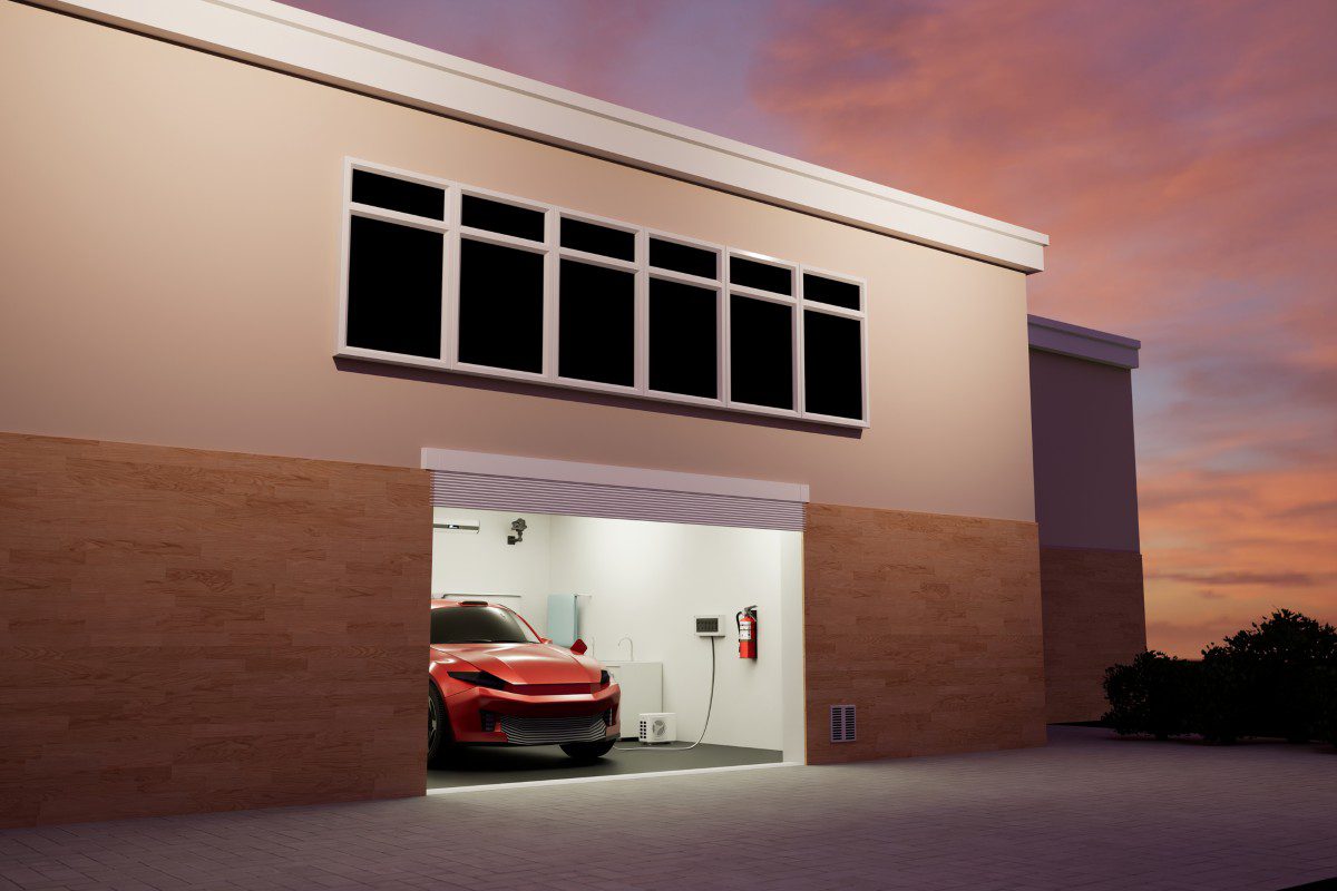 Red car parked in a modern garage.